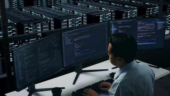 Side View Of Asian Man Developer Having Headache While Write Code In ...