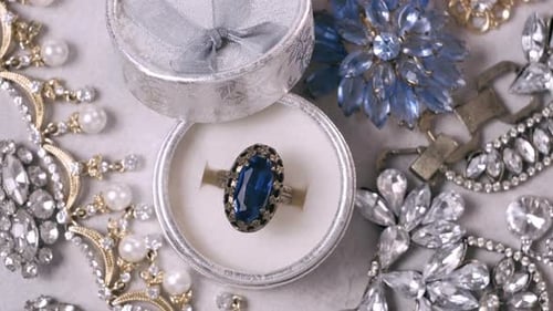 Antique ring with blue gemstone in box and jewel set. Jewellery