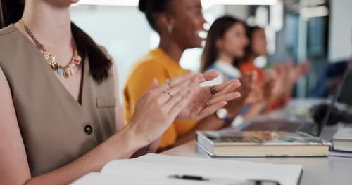 Business Team Applauding and Celebrating Success in Workplace