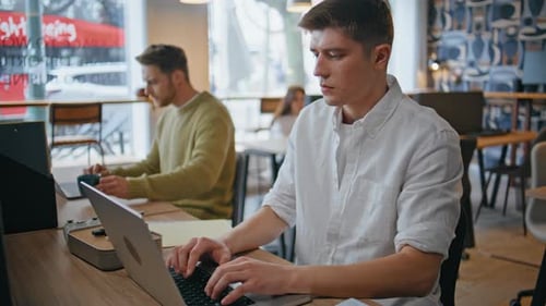 Serious Guy Staring Computer Monitor at Buro Closeup Man Typing Laptop Office