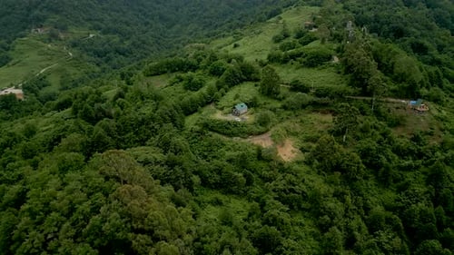 A Beautiful house in the middle of High Mountain surrounded with a lot of trees