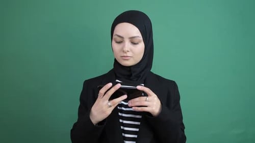 Muslim Woman Show Phone Screen