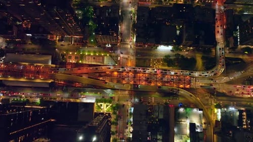 Flight over the Queensboro bridge with busy traffic. Multiple cars moving along the New York.