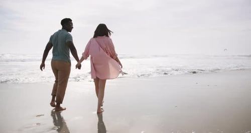 Beach, walking and couple holding hands on romantic date for love, support and travel