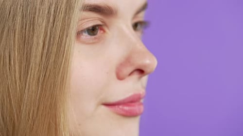 Pretty Blonde Woman Natural Beauty Young Girl on Violet Charming Green Eyes