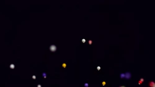 Colorful Spheres Floating on Black Background