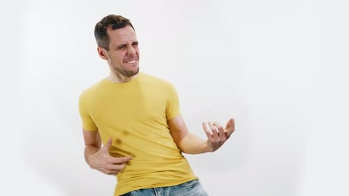 Energetic Man Playing Air Guitar with Enthusiasm