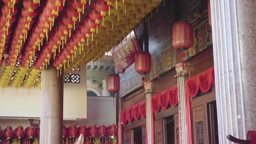 Decorative red Chinese Lantern ceiling in Kek Lok Si temple, pan left