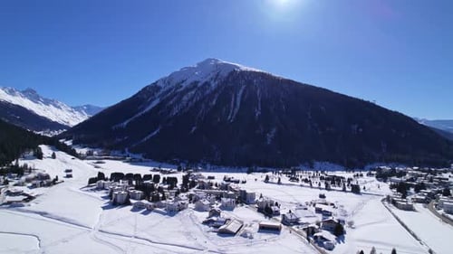 Snowy Mountain Village Aerial View on a Sunny Day