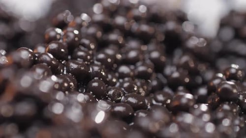 Shiny Brown Spheres Closely Packed Together