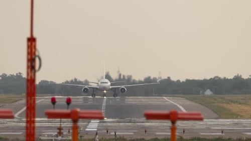 Passenger Jet on Runway Front