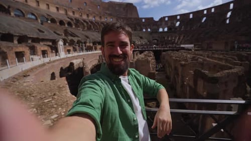 Tourist Taking Selfie at the Colosseum in Rome Italy