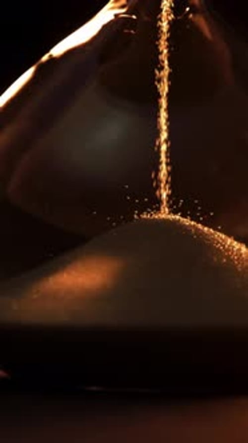 Super Slow Motion Sand Fall in the Hourglass Filmed on a Highspeed Camera at 1000 Fps