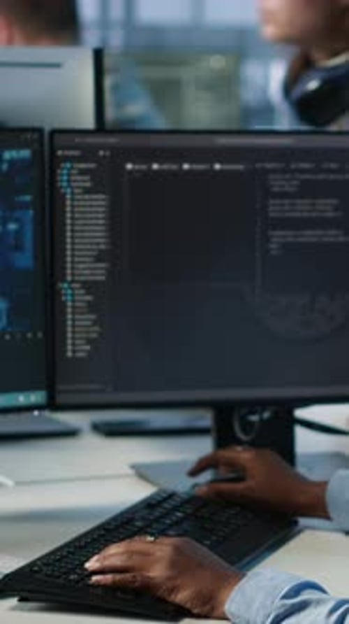 Woman Leaving Desk After Finishing Programming Tasks in AI Data Center