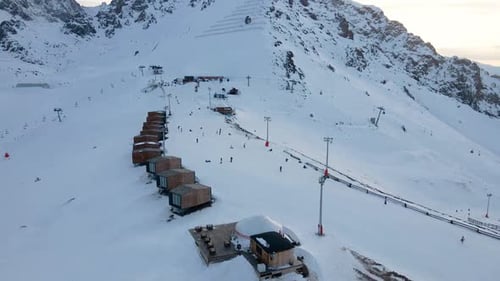 Aerial of Snowy Ski Resort at Mountains