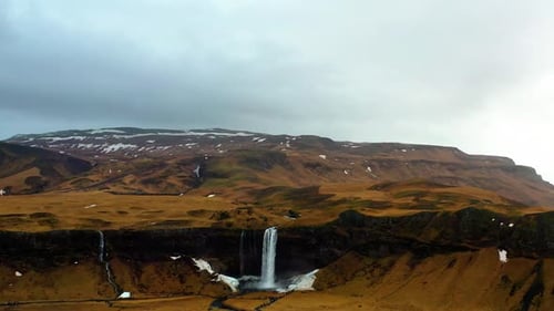 aerial view of the big Seljalandsfoss waterfall in southern Iceland. The waterfall is in center of t