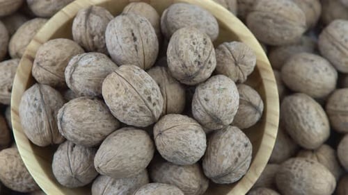 Walnut in Shell Background View From Above Healthy Food Bowl Top View
