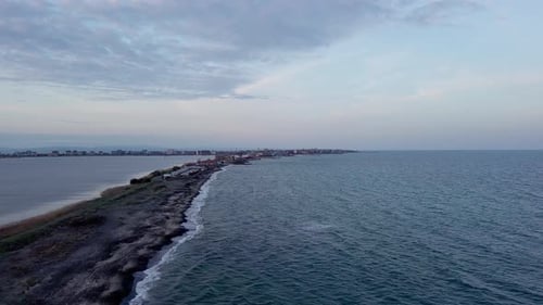 Bird's Eye View of Beach with Sand Grass and Stones Washed By Bay of Black Sea and Lake Under Sky in