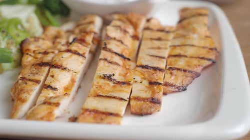 Grilled Chicken with Vegetables on White Plate