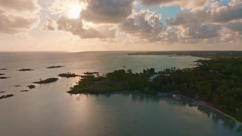 Coastal view of the Mauritius Island at dawn. Aerial drone view of tropical coast before sunset. War