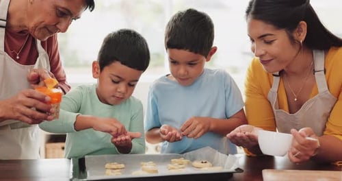 Family Baking Cookies Together in Kitchen