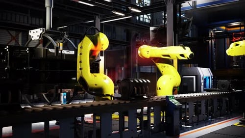 Yellow Robots Standing on Conveyor Belt at Robotic Plant