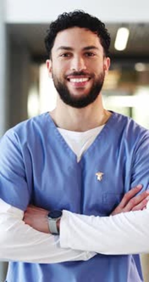 Crossed arms, man and face of nurse in hospital with confidence for about us with nursing career