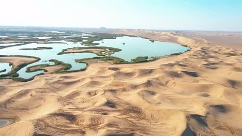 4K Aerial Drone Footage of Sand Dunes and Lakes in the Desert