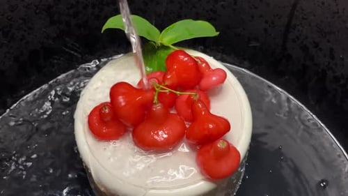 Red guava fruit is watered