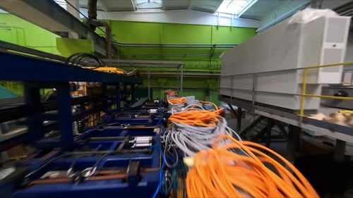 Motion Above Production Line with Coils of Cables at Plant