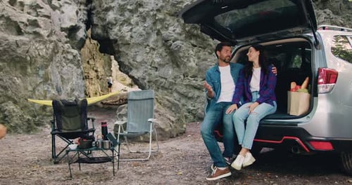 Happy Family Enjoying Time Outdoors on Camping Trip