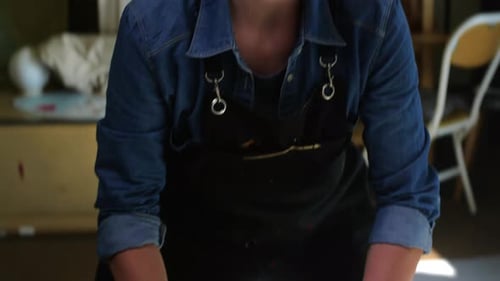 Young Artist Creates Abstract Finger Painting in Studio