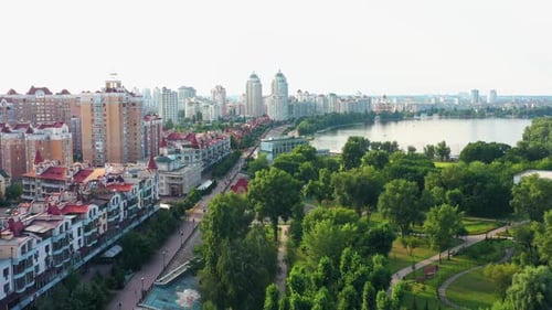 Aerial Drone View of Summer Cityscape with River