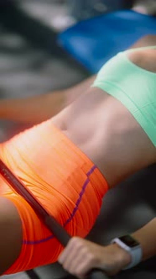 Woman Doing Chest Press with Barbell