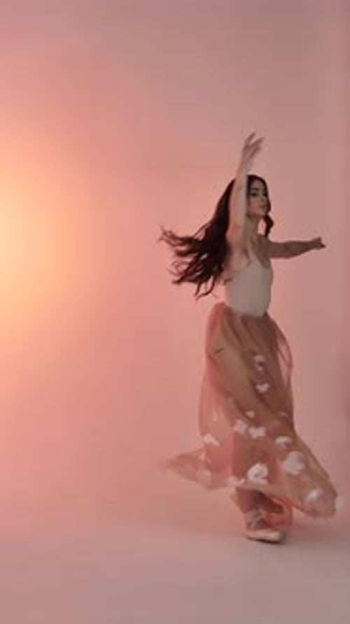 Woman Dancing Gracefully in Studio