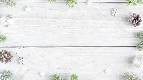 Christmas Composition Frame Made of Snowy Fir Branches Decorations Pine Cones on White Wooden