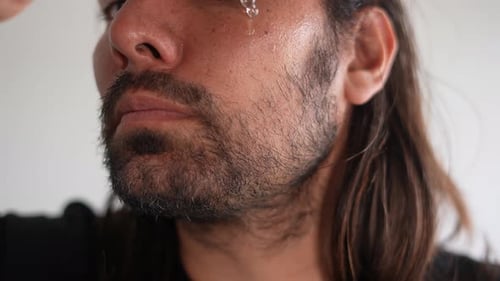 Man Applies Facial Serum Dropper Close Up