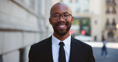Smile, face and business black man in city for attorney, legal representative or professional