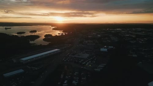 Aerial View of Beautiful Sunset and City with Harbor and Traffic Junction
