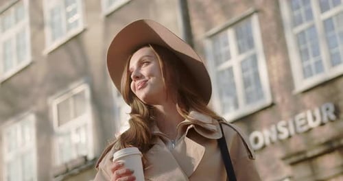 Cute Woman Walking While City Buildings Look Around Feel Happy Smile at Sunlight