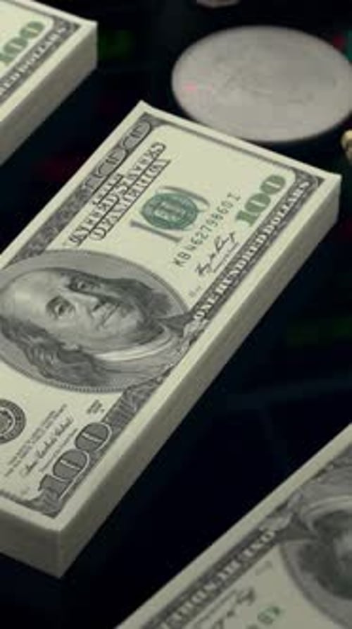 Dollar Money Stack And Silver Coins Finance Background Vertical