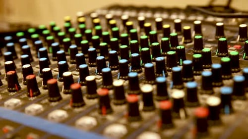 Professional audio mixer with many channels, sideways movement