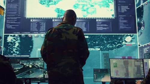 General of the Army Overseeing Special Reconnaissance Mission in Control Center