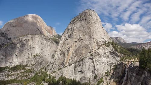 Timelapse in Yosemite National Park with clouds and waterfall