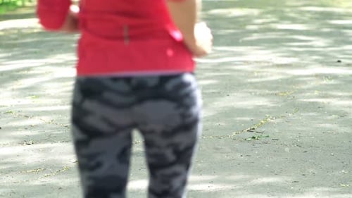 Active Young Couple Jogging in the Park, Super