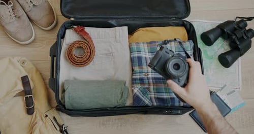 Packing Travel Suitcase, Overhead Shot With Clothes
