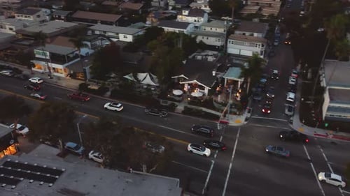 Driving Downtown Laguna Beach on PCH at Sunset. Orange County, Southern California Coast, USA.