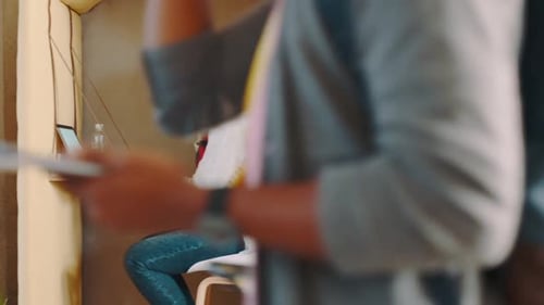 Coworking, office cubicle and freelance employees in a busy workplace, walking