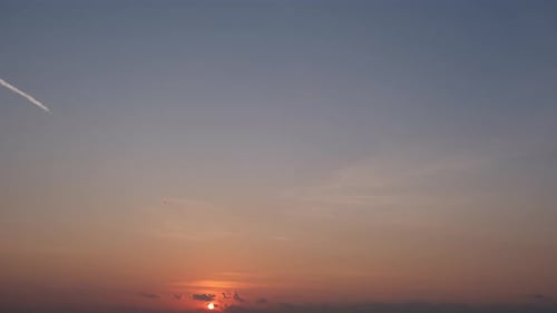 A timelapse captures the sunrise sky, Time-lapse footage.