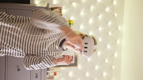 Woman Wearing Virtual Reality Headset at Home